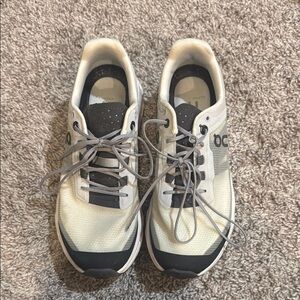 On Running Gray and White Sneakers